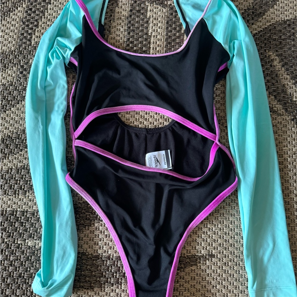 One piece cutout new speedo suit never worn in speedo plastic bag
